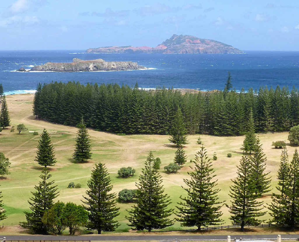 Pines dominate Norfolk Island along with beautiful sand stretches and picturesque views. Pines dominate Norfolk Island along with beautiful sand stretches and picturesque views.